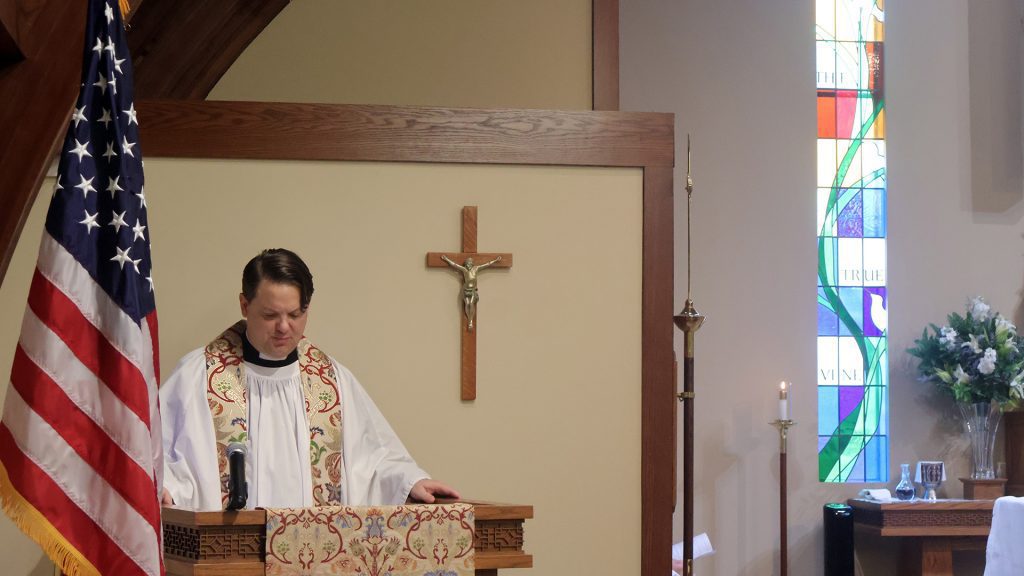 Chas Marks giving a sermon x
