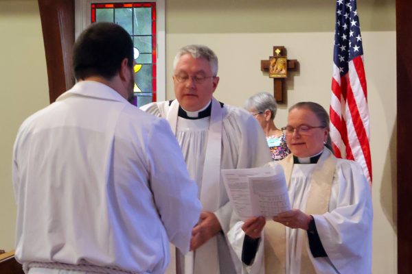 Jon Galles, Robin James, and Tim Coppinger with gifts