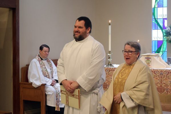 Jon Galles and Bishop Diane addressing the congregation