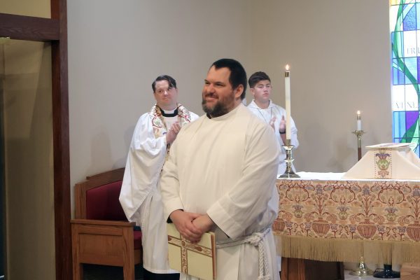Jon Galles in front of the congregation