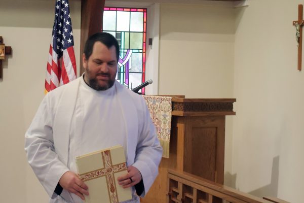 Jon Galles with booklet