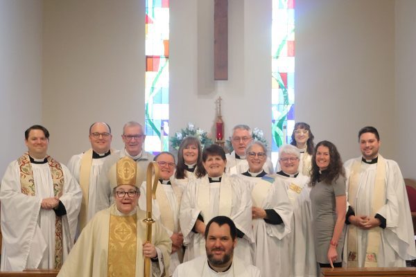 Jon Galles with clergy