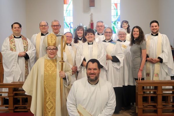 Jon Galles with the clergy x