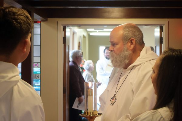 Lay at back of the church