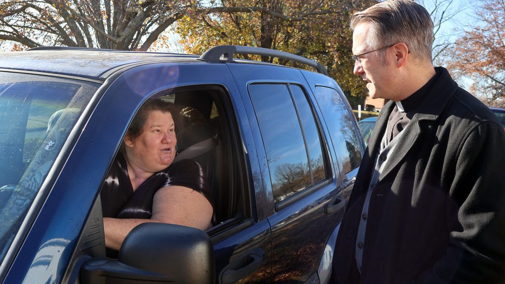 Fr. Ryan with person