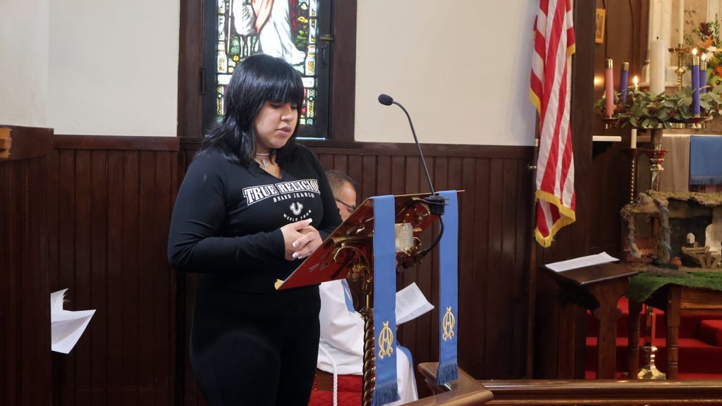 Woman giving the second reading