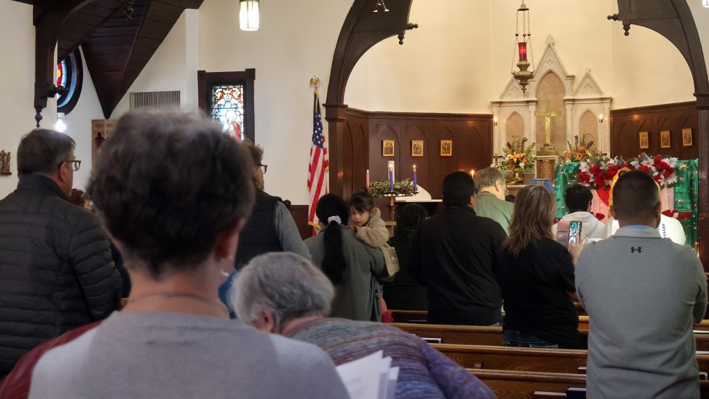 congregation getting ready for the service