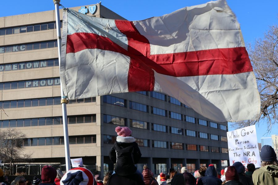 Episcopal Flag Waving Over Crowd