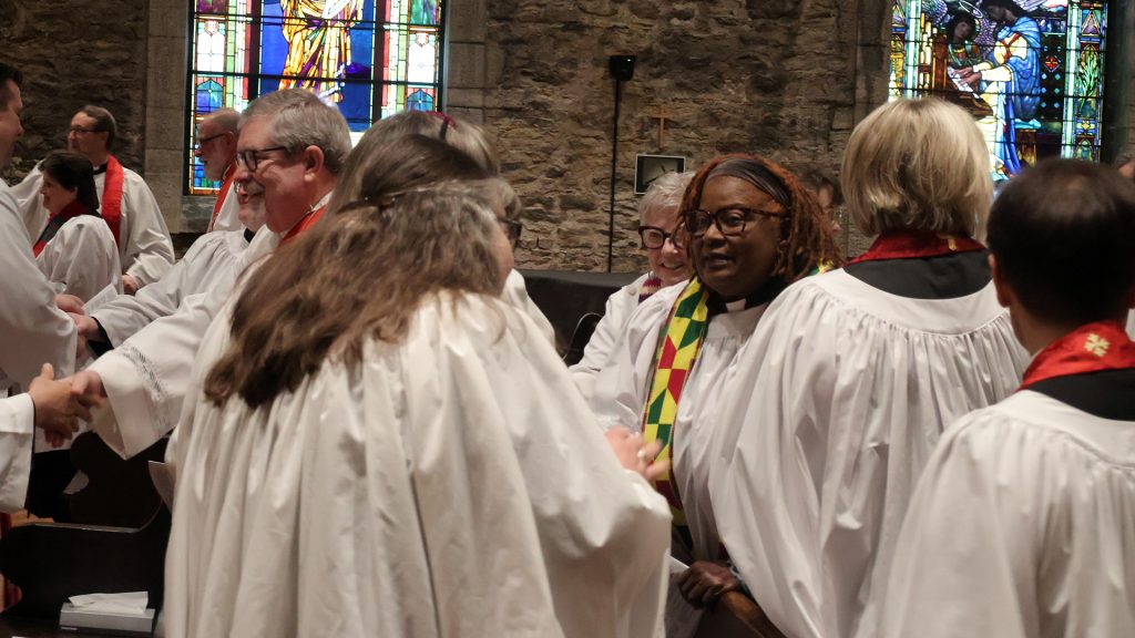 Clergy giving peace at Renewal Service