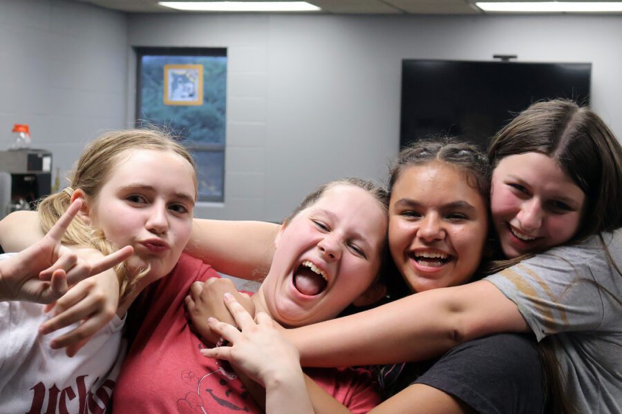 Friends hugging each other